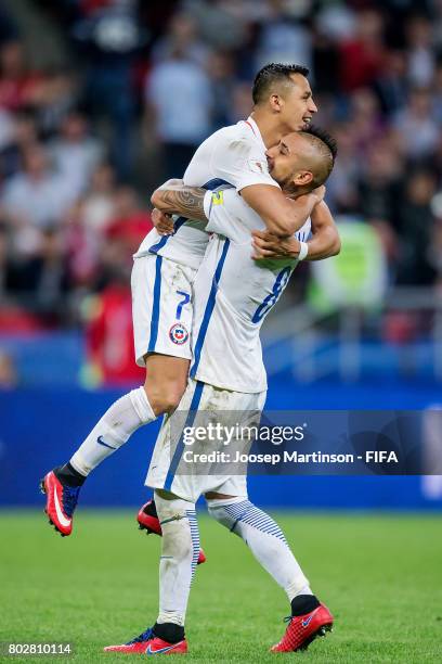 Arturo Vidal and Alexis Sanchez of Chile celebrate after scoring a penalty kick in the penalty shootout during FIFA Confederations Cup Russia...