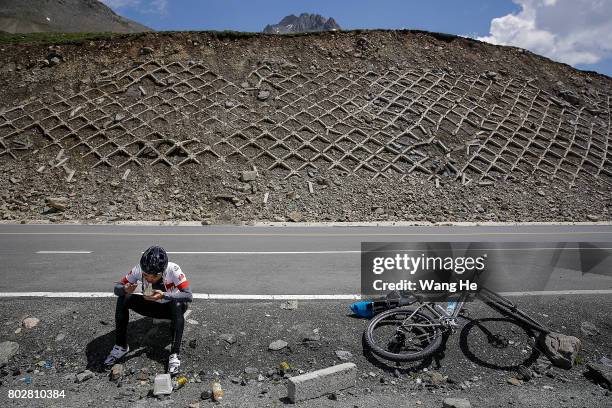 Rider eats noodles on the roadside of the Duku highway on June 28.017 in Xinjiang Uygur Autonomous Region, China. The Duku highway from Dushanzi to...