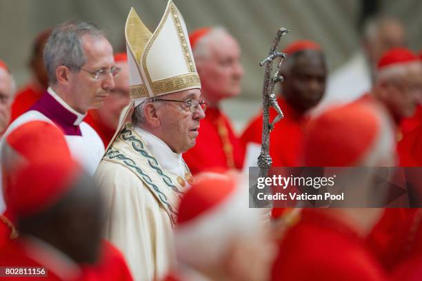 Pope Francis surrounded by cardinals arrives at St. Peter's Basilica for a consistory on June 28, 2017 in Vatican City, Vatican. Pope Francis...