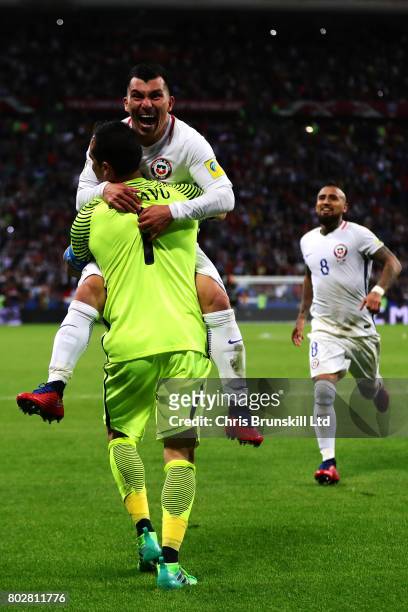 Claudio Bravo of Chile is congratulated by team-mate Gary Medel after the penalty shoot out following the FIFA Confederations Cup Russia 2017...