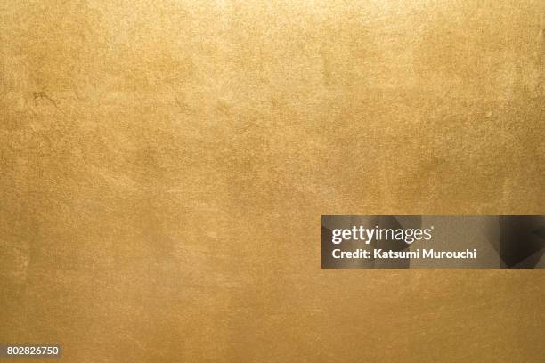 gold texture background - goldfarbig stock-fotos und bilder