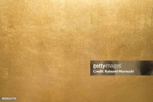 gold texture background - oro fotografías e imágenes de stock