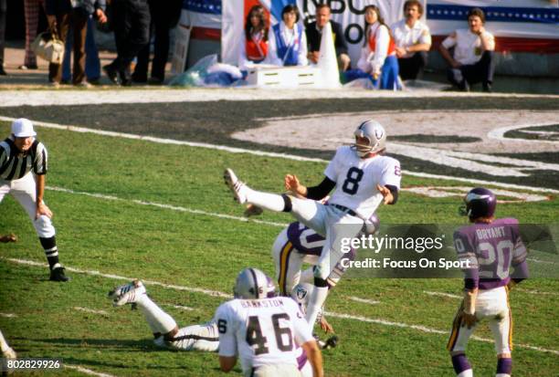 Ray Guy of the Oakland Raiders punts the ball against the Minnesota Vikings during Super Bowl XI on January 9, 1977 at the Rose Bowl in Pasadena,...
