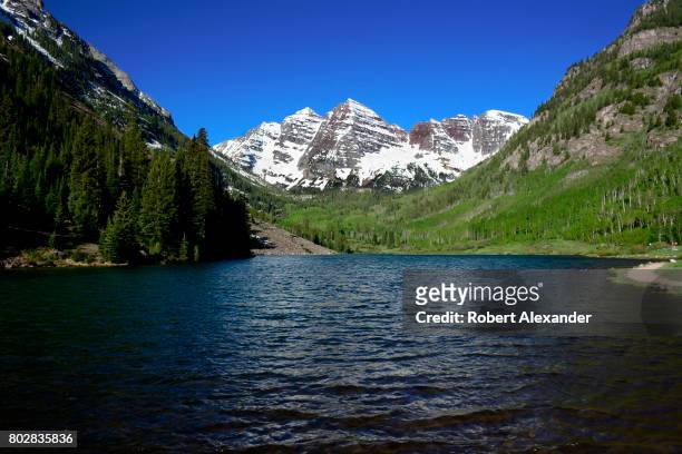 Maroon Lake and the Maroon Bells are popular outdoor recreation destinations near Aspen, Colorado. The Maroon Bells are two peaks in the Elk...