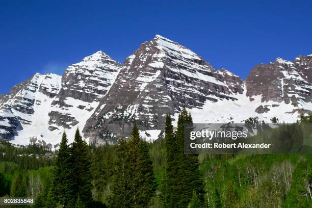 The Maroon Bells near Aspen, Colorado, are two peaks in the Elk Mountains - Maroon Peak and North Maroon Peak. They are located in the Maroon...
