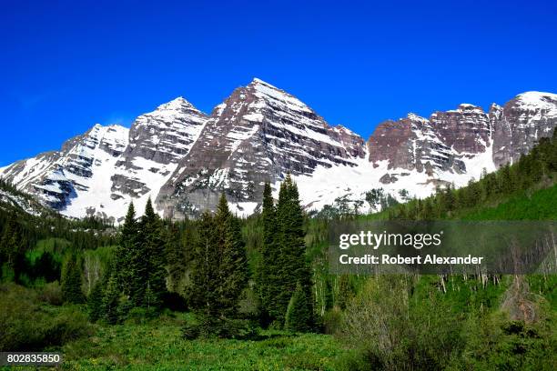 The Maroon Bells near Aspen, Colorado, are two peaks in the Elk Mountains - Maroon Peak and North Maroon Peak. They are located in the Maroon...