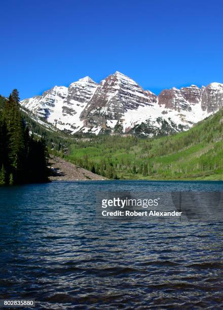 Maroon Lake and the Maroon Bells are popular outdoor recreation destinations near Aspen, Colorado. The Maroon Bells are two peaks in the Elk...