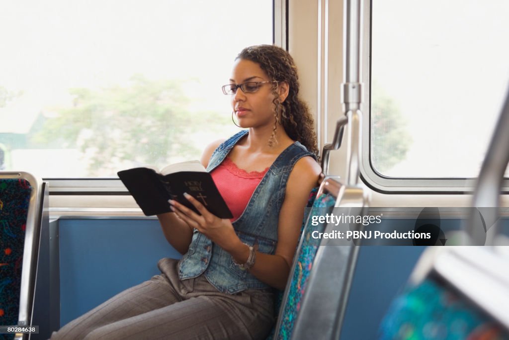 African woman reading bible