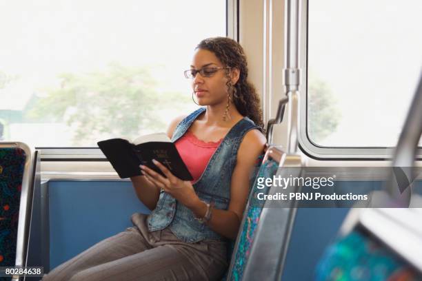 african woman reading bible - black women in the bible stock pictures, royalty-free photos & images