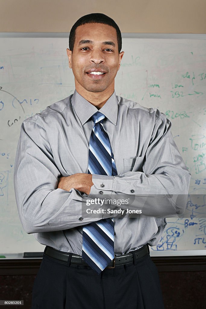 African american man (38) standing in front of whiteboard
