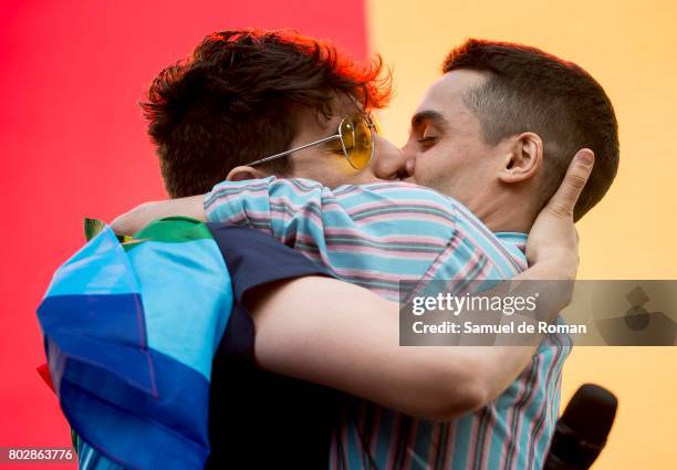 Javier Ambrossi kisses his boyfriend Javier Calvo during the opening speech at the Madrid World Pride 2017 on June 28, 2017 in Madrid, Spain.