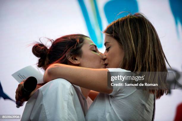 Dulceida kisses his girlfriend during the opening speech at the Madrid World Pride 2017 on June 28, 2017 in Madrid, Spain.