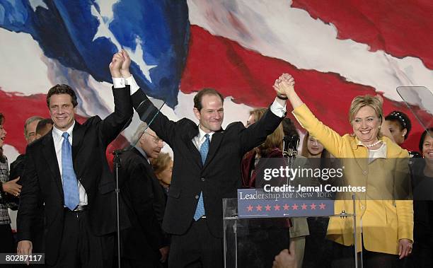 Andrew Cuomo, Eliot Spitzer and Hillary Rodham Clinton celebrate with the crowd of Democratic supporters following their wins in their various races...