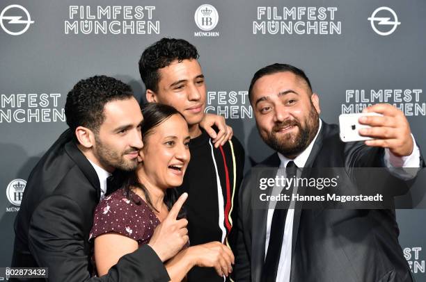 Hassan Akkouch, Meriam Abbas, Mahamed Issa and Kailas Mahadevan attend the 'Fremde Tochter' Premiere during Film Festival Munich 2017 at Arri Kino on...