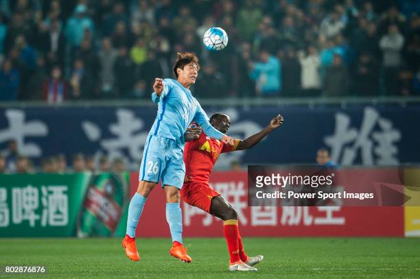 Adelaide United Forward Papa Babacar Diawara fights for the ball with Jiangsu FC Defender Hong Jeongho during the AFC Champions League 2017 Group H...