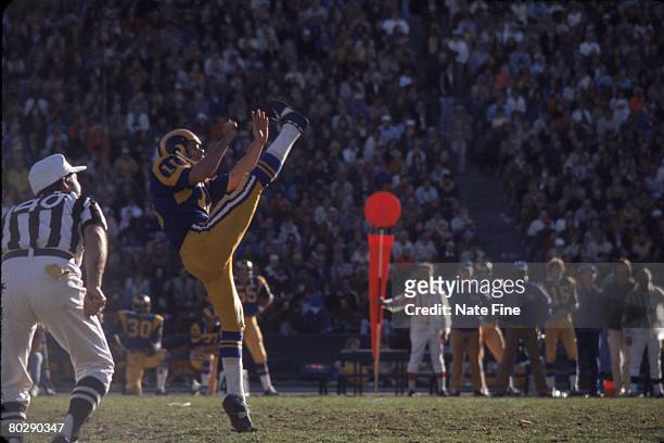 punter-mike-burke-of-the-los-angeles-rams-punts-against-the-washington-redskins-in-the-1974-nfc.jpg