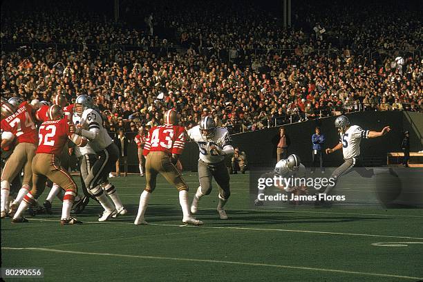 Kicker Toni Fritsch of the Dallas Cowboys kicks a field goal against the San Francisco 49ers in the 1972 NFC Championship Game at Candlestick Park on...