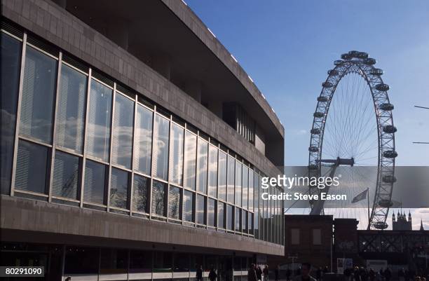 The Royal Festival Hall and the British Airways London Eye, on the Southbank in London, circa 2000. The Eye, based on London's South Bank, takes 30...