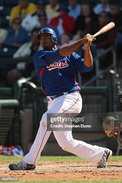 Nelson Cruz of the Texas Rangers bats against the Milwaukee Brewers on March 5, 2008 at Surprise Stadium in Surprise, Arizona. The Brewers won 12-6.