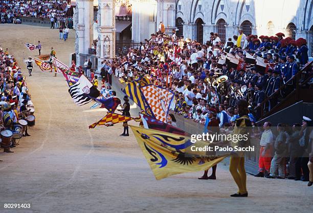 parade in siena during the palio festivities. italy - palio di siena stock-fotos und bilder
