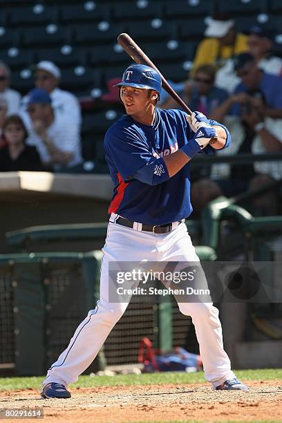 Jarrod Saltalamacchia of the Texas Rangers bats against the Milwaukee Brewers on March 5, 2008 at Surprise Stadium in Surprise, Arizona. The Brewers...