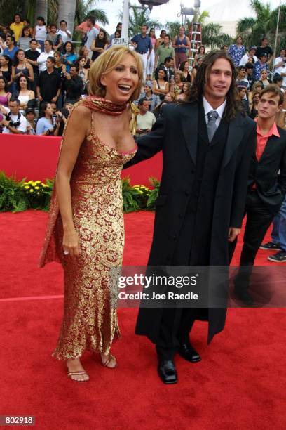 Laura Bozzo, left, and an unidentified guest arrive at the 12th Annual Billboard Latin Music Awards April 26, 2001 in Miami Beach, FL. The event is a...