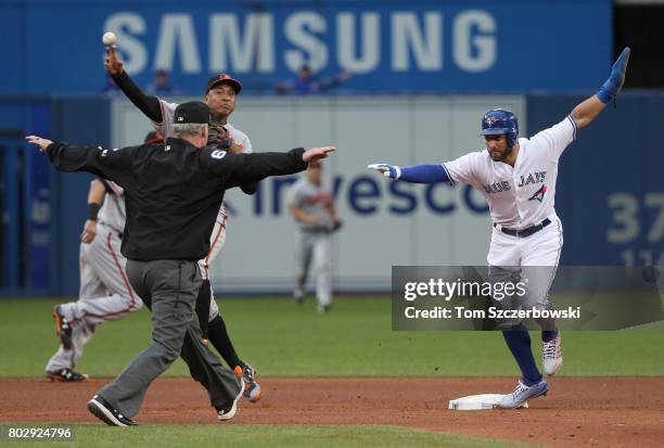 Kevin Pillar of the Toronto Blue Jays reaches second base safely on a fielderâs choice allowing a run to score on the play in the fourth inning...