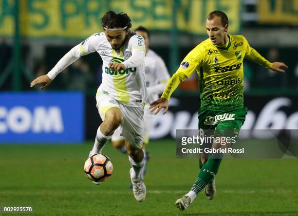 Apodi of Chapecoense fights for the ball with Tomas Pochettino of Defensa y Justicia during a first leg match between Defensa y Justicia and...
