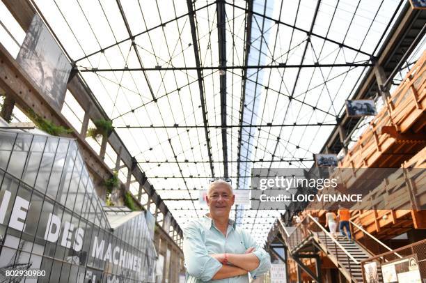 "Les Machines de L'Ile" director Pierre Orefice poses, on June 20 poses in the nave, in Nantes, western France. - It walks its 48-ton metal carcass...