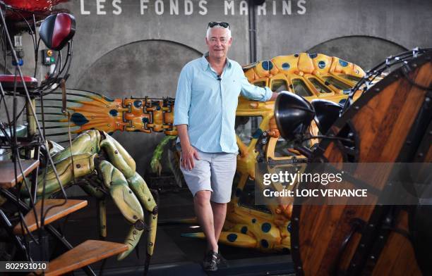 "Les Machines de L'Ile" director Pierre Orefice poses, on June 20 in the "Carrousel des Mondes Marins" in Nantes, western France. - It walks its...