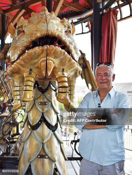 "Les Machines de L'Ile" director Pierre Orefice poses, on June 20 in the "Carrousel des Mondes Marins" in Nantes, western France. It walks its 48-ton...