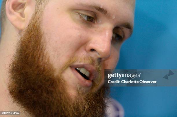 The Charlotte Hornets' Przemek Karnowski talks to the media after practice at the Spectrum Center in Charlotte, N.C., on Wednesday, June 28, 2017.