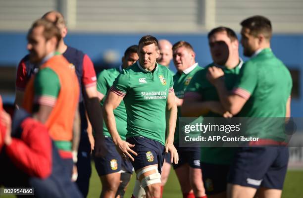 British and Irish Lions captain Sam Warburton warms up in training ahead of their game against the New Zealand All Blacks in Wellington on June 29,...