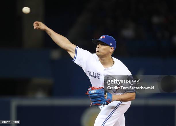 Roberto Osuna of the Toronto Blue Jays delivers a pitch in the ninth inning during MLB game action against the Baltimore Orioles at Rogers Centre on...