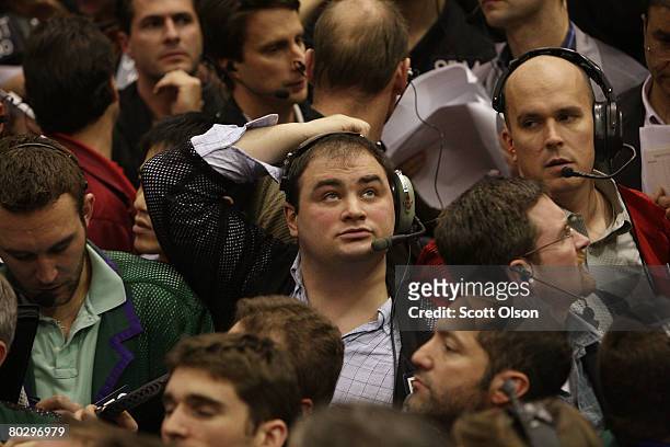 Trader watches offers in the Eurodollar options pit at the Chicago Mercantile Exchange following the announcement from the Federal Open Market...