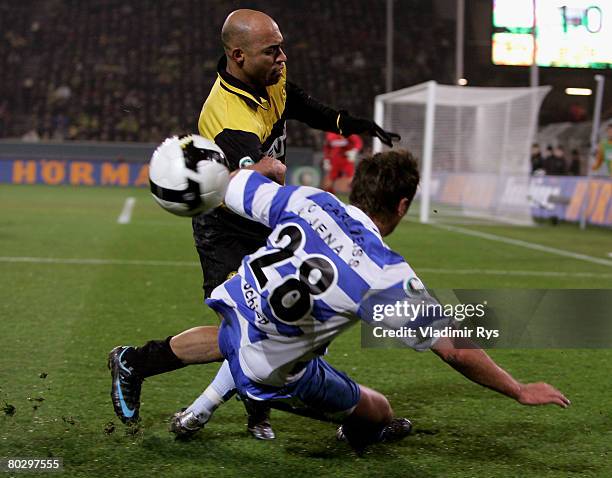Dede of Dortmund and Marcel Schied of Jena battle for the ball during the DFB Cup semi final match between Borussia Dortmund and Carl Zeiss Jena at...