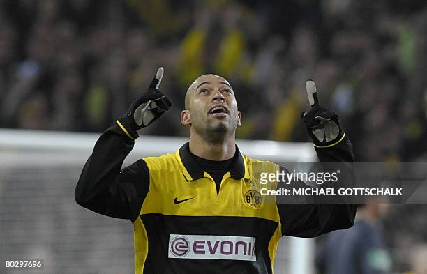 Dortmund's South African striker Delron Buckley celebrates his team's third goal during the German Cup semi-final football match Borussia Dortmund...