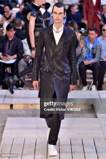 Model walks the runway during the Alexander Mcqueen Menswear Spring/Summer 2018 show as part of Paris Fashion Week on June 25, 2017 in Paris, France.