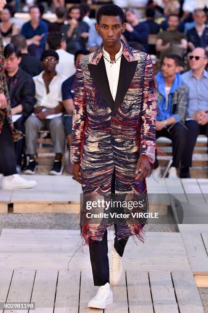 Model walks the runway during the Alexander Mcqueen Menswear Spring/Summer 2018 show as part of Paris Fashion Week on June 25, 2017 in Paris, France.