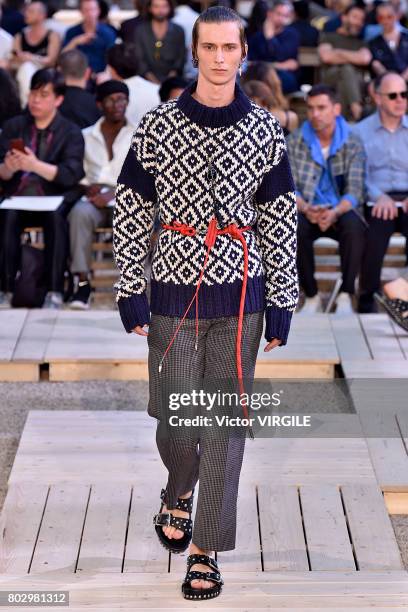 Model walks the runway during the Alexander Mcqueen Menswear Spring/Summer 2018 show as part of Paris Fashion Week on June 25, 2017 in Paris, France.