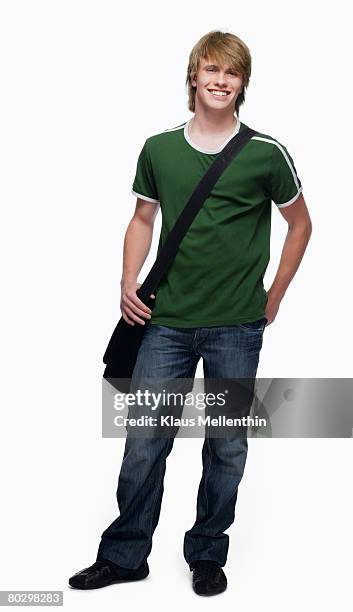 teenage boy (16-17) smiling, portrait - schultertasche stock-fotos und bilder
