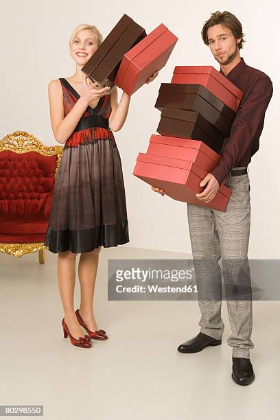 man carrying shoeboxes, portrait - man throne stock pictures, royalty-free photos & images