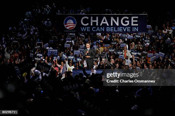 Democratic presidential candidate Sen. Barack Obama of Illinois and his wife Michelle greet supporters at a rally on the eve of the Texas...