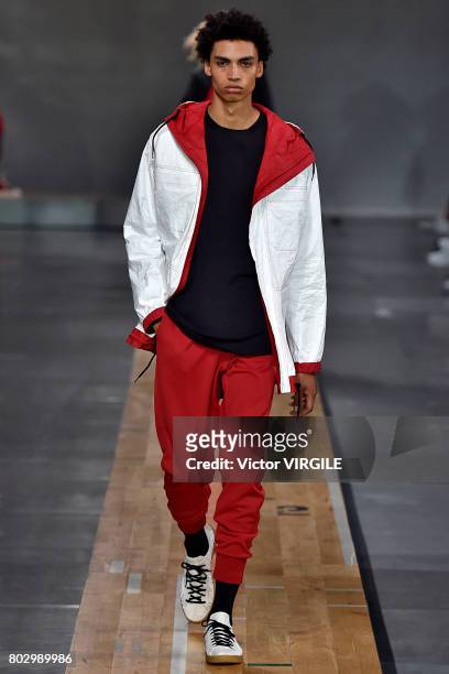 Model walks the runway during the Y3 Menswear Spring/Summer 2018 show as part of Paris Fashion Week on June 25, 2017 in Paris, France.