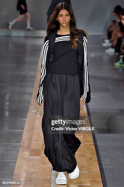 Model walks the runway during the Y3 Menswear Spring/Summer 2018 show as part of Paris Fashion Week on June 25, 2017 in Paris, France.