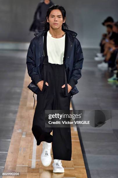 Model walks the runway during the Y3 Menswear Spring/Summer 2018 show as part of Paris Fashion Week on June 25, 2017 in Paris, France.