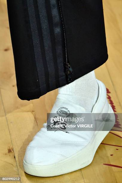 Model walks the runway during the Y3 Menswear Spring/Summer 2018 show as part of Paris Fashion Week on June 25, 2017 in Paris, France.