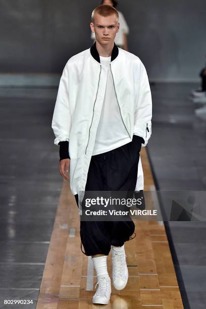 Model walks the runway during the Y3 Menswear Spring/Summer 2018 show as part of Paris Fashion Week on June 25, 2017 in Paris, France.