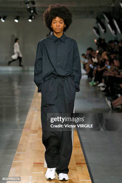 Model walks the runway during the Y3 Menswear Spring/Summer 2018 show as part of Paris Fashion Week on June 25, 2017 in Paris, France.