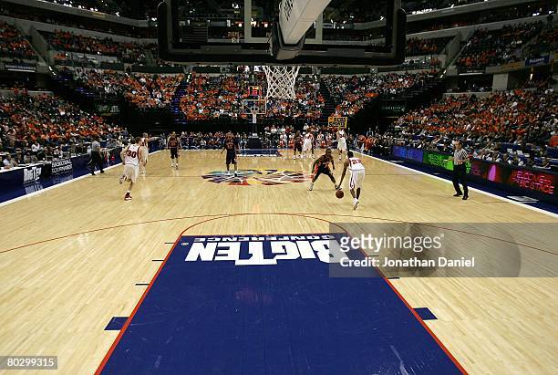 General view of action as Michael FLowers of the Wisconsin Badgers brings the ball to half-court against the Illinois Fighting Illini during the...